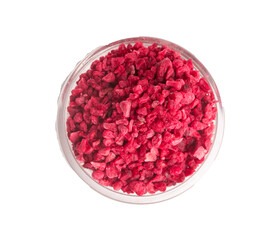 bowl with freeze dried raspberries on white background