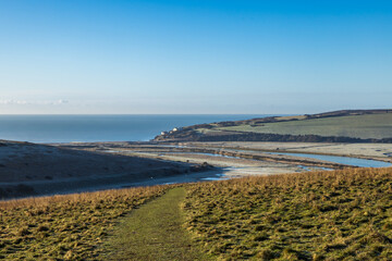 A view towards Cuckmere Haven in the South Downs, on a sunny but cold winter's day