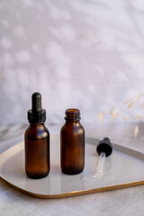 Amber Glass bottles with face serum 