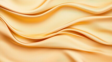 A close-up view of smooth, flowing yellow silk fabric, highlighting its soft texture and elegant sheen, perfect for fashion or textile design.