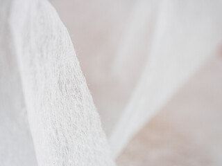 Lightweight, flexible nonwoven fabric. Ideal for various applications. Material properties &...