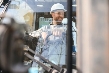 Warehouse man worker with forklift © Serhii