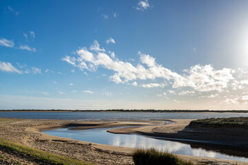 El Portil beach, between the municipalities of Cartaya and Punta Umbría. The sun bathes long, beautiful kilometers of white sand. Andalusia, Spain. vacations concept