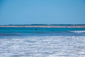 View of the beaches of Mar del Plata with the cliffs in the background on a sunny day