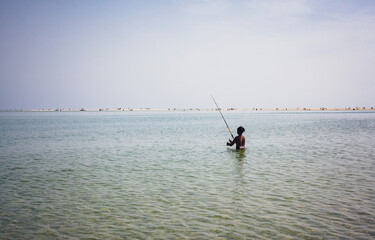 fishing on the algarve beach