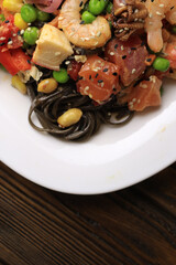 Tasty poke food with seafood and vegetables