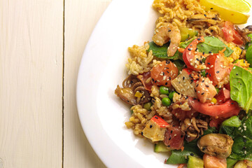 Tasty poke food with seafood and vegetables