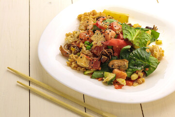 Tasty poke food with seafood and vegetables