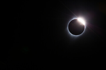USA, Wyoming. Total solar eclipse. The 'Diamond Ring' effect is seen as the moon makes its final move over the sun. The ring is the sun's corona.