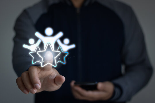 Businessman hand touch business client retention icon, people membership group with star. Customer experience concept, best excellent service rating for satisfaction. Customer Relationship Management.