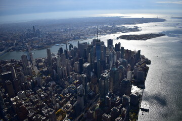 Aerial view of Manhattan&rsquo;s skyline with skyscrapers, rivers, and streets. Urban landscape, New York City, cityscape, architecture, aerial photography, metropolis, travel, modern city, iconic view