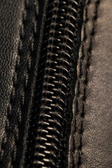 genuine leather painted black with seams