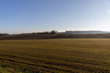 traces of tractors and other agricultural machinery on the soil in the field