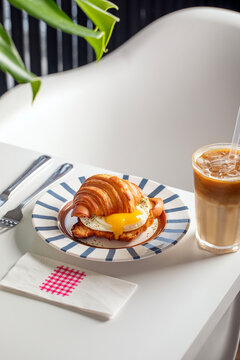 Breakfast table, Croissant and Coffee served on a restaurant table
