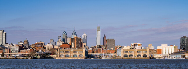 Panoramic view of the Philadelphia Pennsylvana skyline seen from the Wiggins Park Promenade on the Camden New Jersey side odf the Delaware River