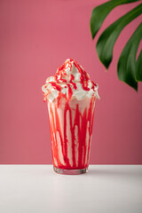 Gourmet Milkshake cup on artistic background