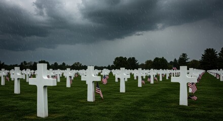 Dramatic sky over memorial cemetery honoring fallen soldiers with flags