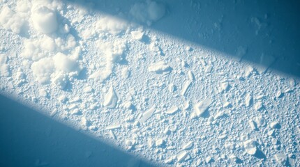 High angle view of snow and ice creates a textured winter landscape, showing the beauty of the cold season.