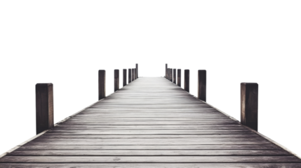 Long wooden pier extending into transparent background