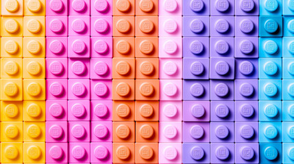 Colorful plastic blocks arranged in vertical stripes.