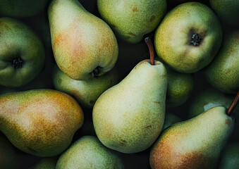 Ripe pears with smooth green skin arranged on a wooden surface, high-quality image capturing the fresh and natural appearance of the fruit, top view composition.