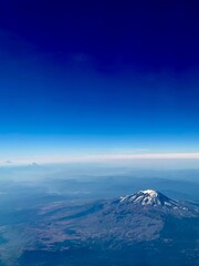 view of volcano from an airplane