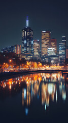 Naklejka premium Vibrant Nighttime Cityscape with Reflective Skyscraper Lights