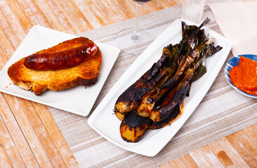 Traditional spanish foods - calsot, romesco, butifarra