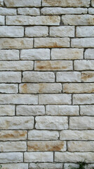 Obraz premium White and Tan Brick Wall Texture Creates a Rustic and Textured Background