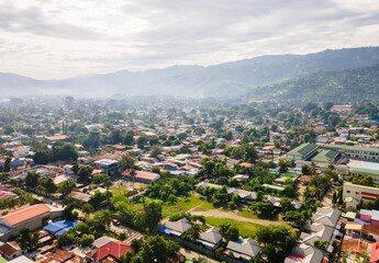 One part of Dili city seen from the height, residential and business area. Dili city is the capital of Timor Leste. Located on the coast and surrounded by hills.