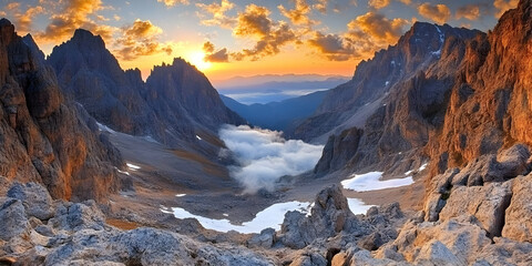 Fototapeta premium Rocky Mountains Embrace the Golden Sunrise with Majestic Peaks and a Breathtaking View.