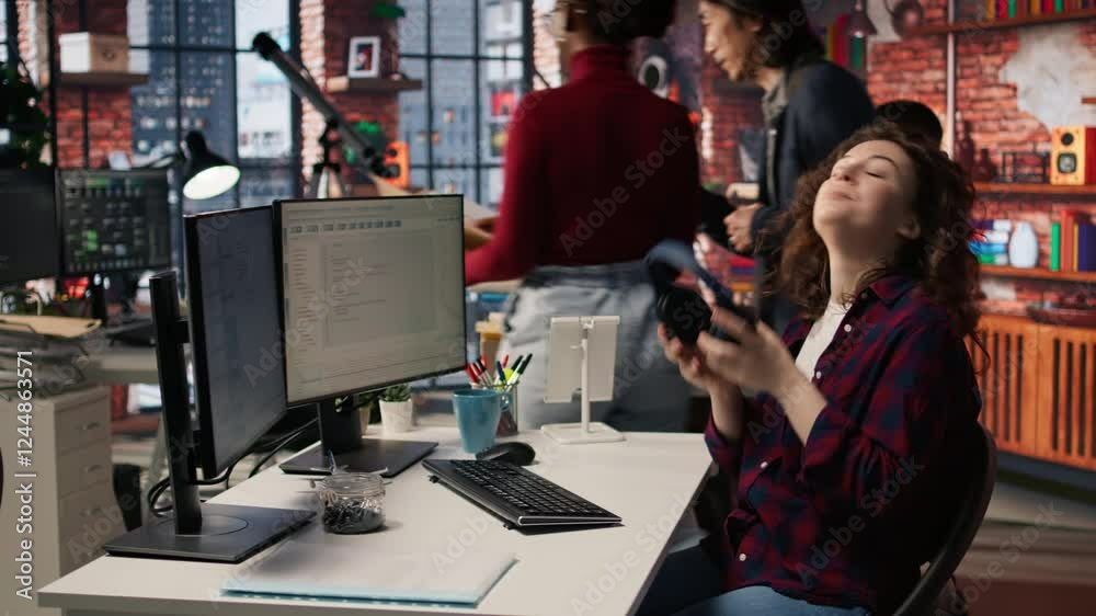 Poster startup it expert looking for company security vulnerabilities while listening music. software devel