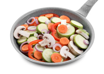 Frying pan with mix of fresh vegetables and mushrooms isolated on white