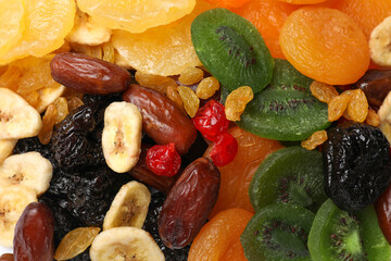 Mix of different dried fruits as background, closeup