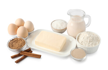 Making cinnamon rolls. Different ingredients for dough isolated on white
