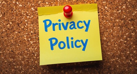 privacy policy word written on a note sticky on corkboard