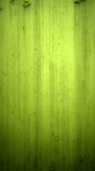 Green Textured Metal Surface Shows Signs of Wear and Tear with Vertical Streaks