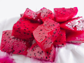 Dragon fruit slices isolated on white background