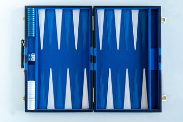 Blue Backgammon board on a white table