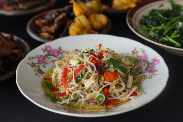 Flavorful Indonesian cuisine rich in spices, captured on February 6, 2025. The vibrant colors and aromatic ingredients create a delicious and authentic culinary scene