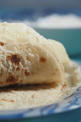 homemade roti chapati on table .