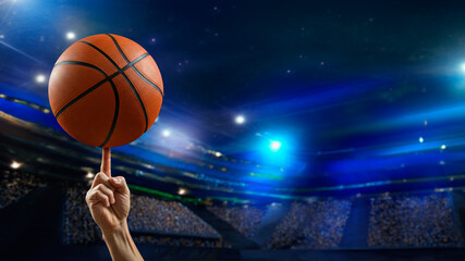 Basket ball spinning on a finger