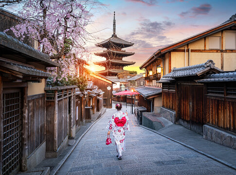 Japanese woman wearing a traditional Japanese kimono at Yasaka Pagoda and Sannen Zaka Street in Kyoto, Japan.	