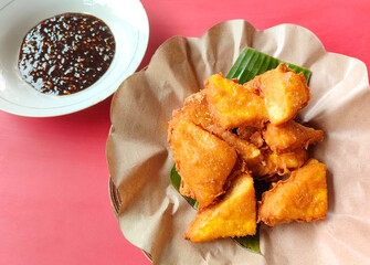 Fried Crispy Tofu (Tahu Goreng Krispi) - A typical Indonesian culinary food with delicious taste. close up view