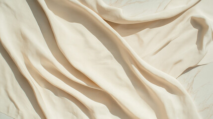 Fototapeta premium Soft Beige Fabric with Elegant Folds and Natural Light, Highlighting Texture and Minimalist Aesthetic in a Serene Composition