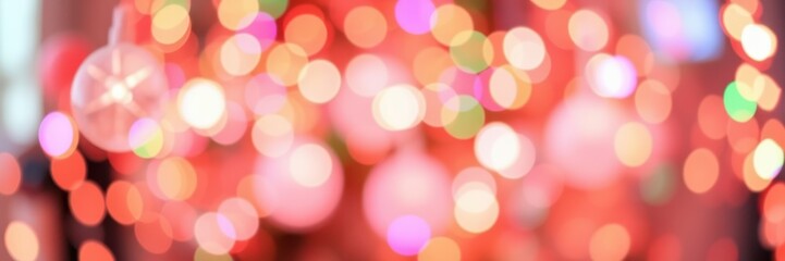 Colorful bokeh lights create a festive atmosphere during an evening event in a vibrant urban setting