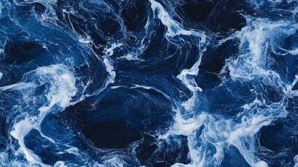 Obraz premium Dark Blue Ocean Waves with White Foam Creating a Beautiful Abstract Texture for Backgrounds and Design Projects