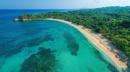Tropical paradise beach with turquoise water and lush greenery