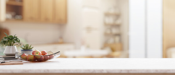 A kitchen countertop with a blurred background of a contemporary Scandinavian kitchen.