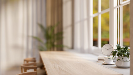 A close-up of a copy space on a wooden desk against a window in a cozy Scandinavian coffee shop.